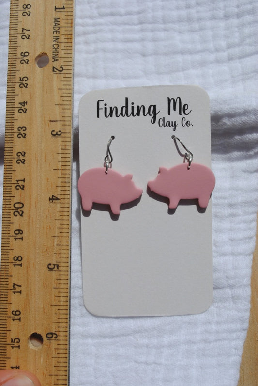 Pig dangles